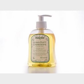 Flydende honningsbe med pumpe